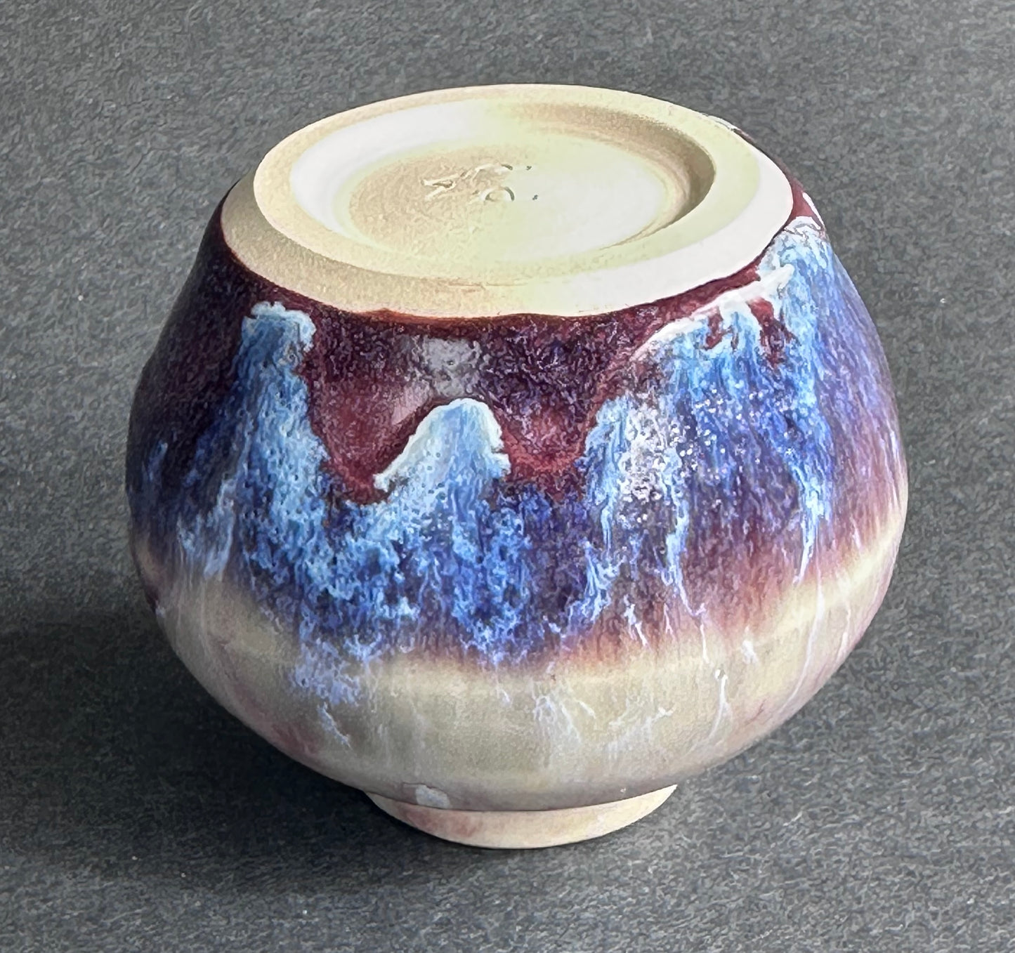 Purple round porcelain bud vase