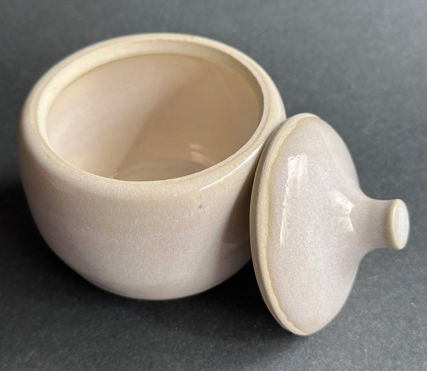 White lidded jar