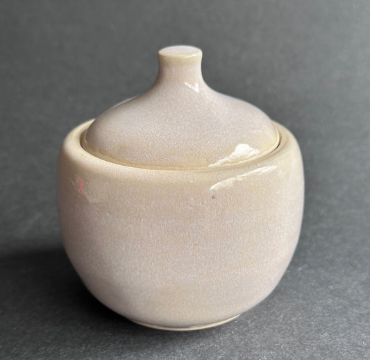 White lidded jar