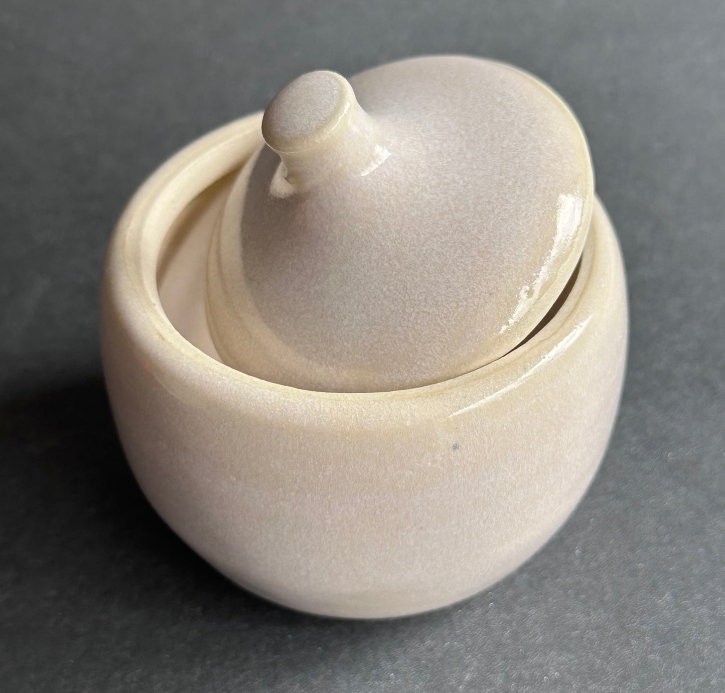 White lidded jar